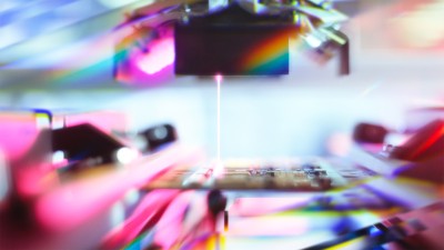 A laser engraving small details on a chip.